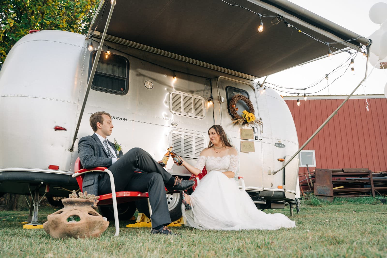 Couple photo in front of camper